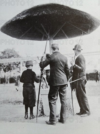 The mushroom head protector used in an archery contest, Belgium 1914.