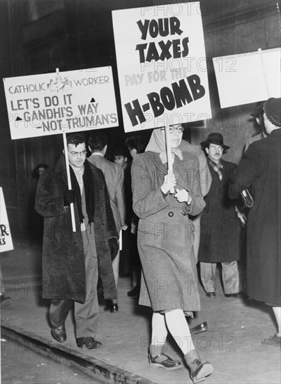 picketing against the use of tax dollars for the development of nuclear weapons