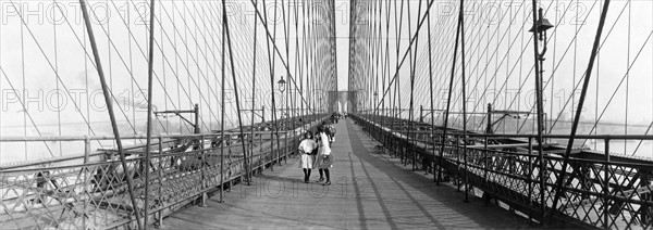 Photograph of Children walking across the Brooklyn Bridge