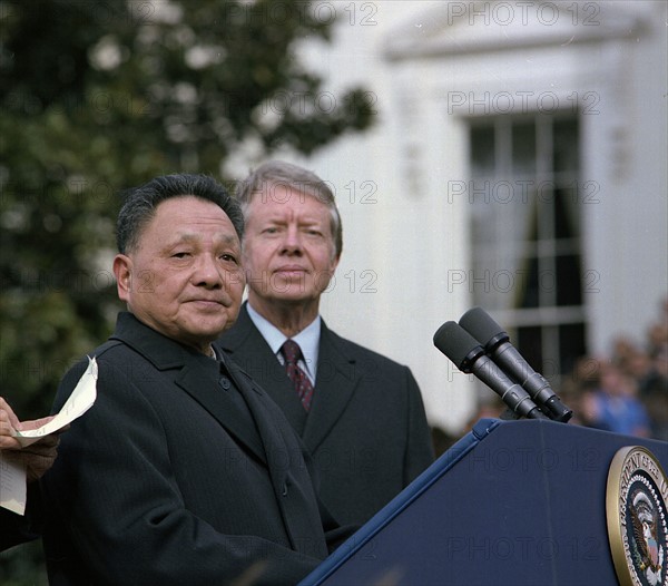 Deng Xiaoping and Jimmy Carter at the Chinese Vice Premier's arrival ceremony