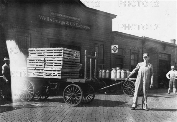 Expressmen in front of a Wells Fargo & Co Express depot