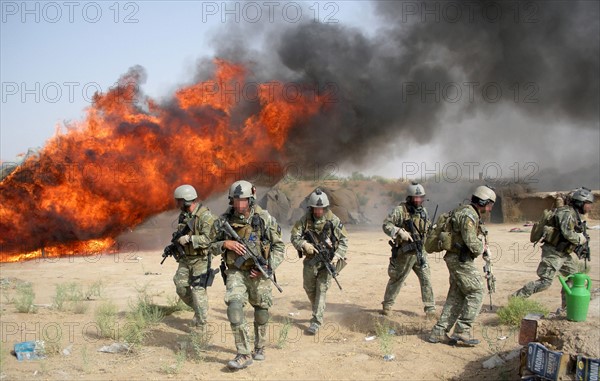 Afghan and DEA Special Agents destroying hashish bunkers