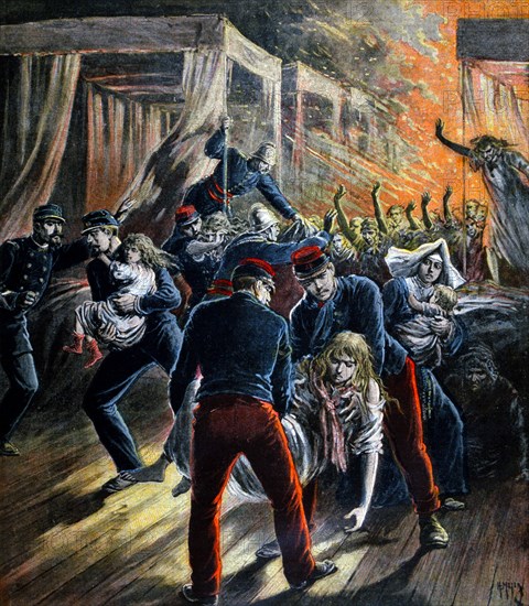 Patients are evacuated during a fire at Saint-Sauveur hospital, Lille, France, 1896