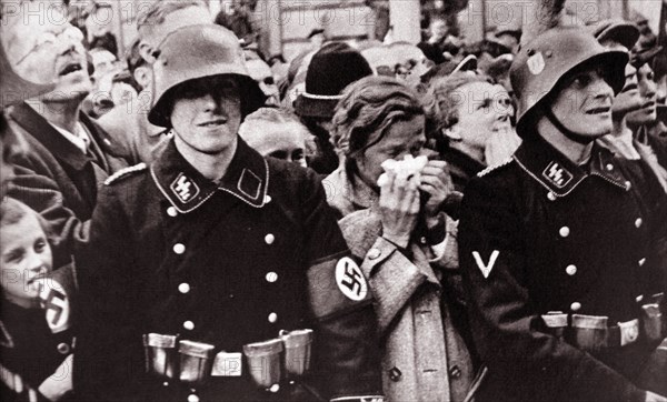 Austrian crowds show emotion and anticipation as German forces enter Vienna during the Anschluss