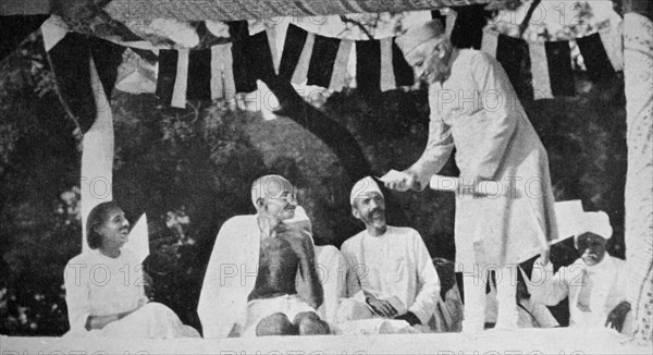 Mahatma Gandhi at a meeting in Allahabad, presided over by Motilal Nehru