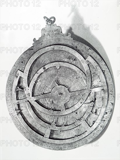 View of the front of a brass astrolabe