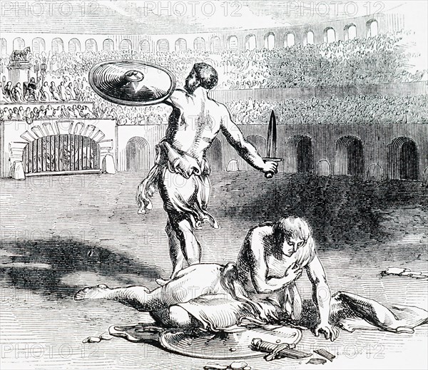 Gladiators fighting within the Colosseum in Rome