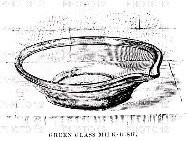 A green glass milk-dish in which the cream was allowed to rise