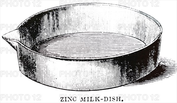 A zinc milk dish in which the cream was allowed to rise
