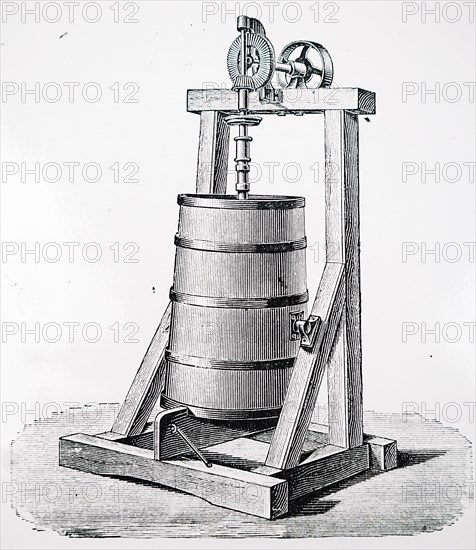 A Holstein vertical butter churn