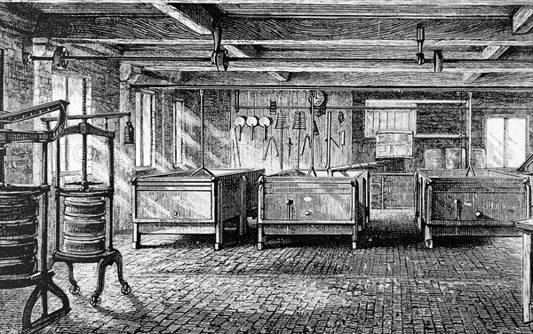 The interior of the Brailsford Cheese Factory near Derby, showing milk vats and cheese presses