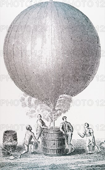 Jacques Charles, with the help of the Robert Brothers filling his balloon with hydrogen