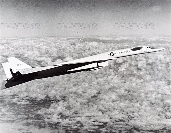 Photograph of a North American XB-70 Valkyrie, a bomber for the United States Air Force Strategic Air Command, in flight