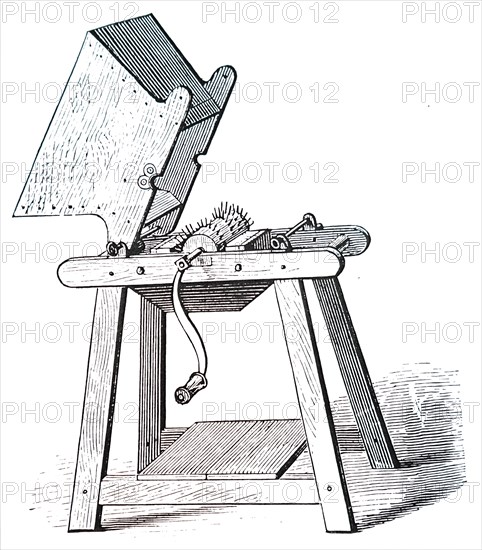 A curd mill for grinding the curd before placing it with salt in a cheese vat, used in the manufacturing Cheshire cheese