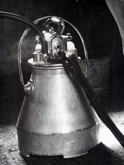 Photograph of an electric milking machine