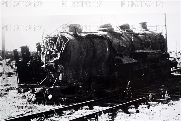 Photograph showing the wreckage of a train at Trappes, in the western suburbs of Paris, in the south-western suburbs of Paris , during the liberation of France from German occupation in the summer of 1944