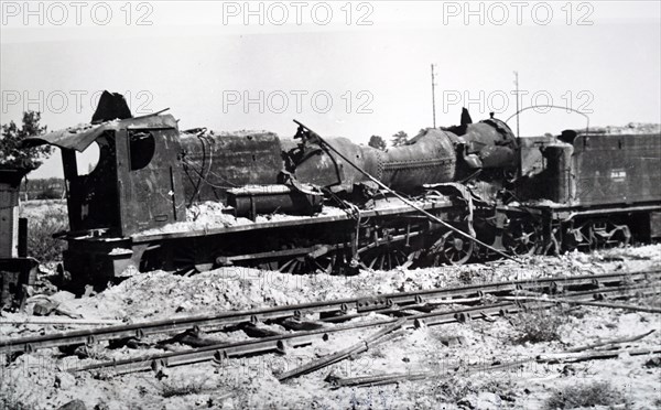 Photograph showing the wreckage of a train at Trappes, in the western suburbs of Paris, in the south-western suburbs of Paris , during the liberation of France from German occupation in the summer of 1944