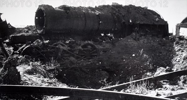 Photograph showing the wreckage of a train at Trappes, in the western suburbs of Paris, in the south-western suburbs of Paris , during the liberation of France from German occupation in the summer of 1944