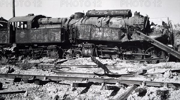 Photograph showing the wreckage of a train at Trappes, in the western suburbs of Paris, in the south-western suburbs of Paris , during the liberation of France from German occupation in the summer of 1944