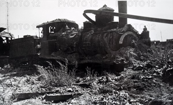 Photograph showing the wreckage of a train at Trappes, in the western suburbs of Paris, in the south-western suburbs of Paris , during the liberation of France from German occupation in the summer of 1944