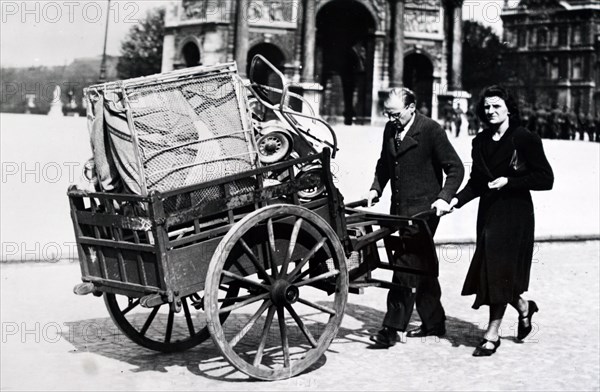 Photograph of returning refugees in Paris during the German occupation of France 1940