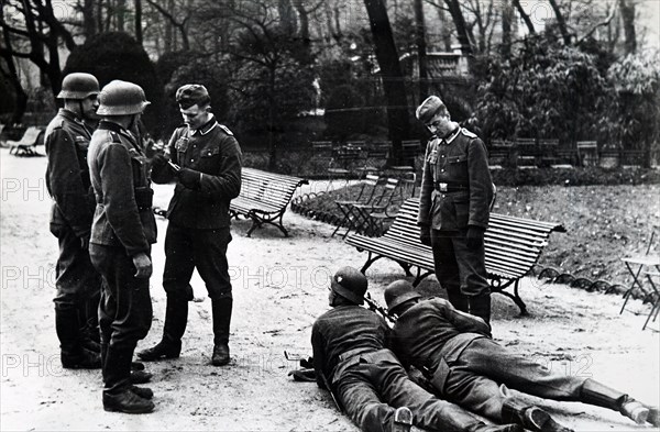 Photograph of German Army soldiers practicing in the Parc Monceau in Paris, after the Invasion of France in 1940, in World War Two
