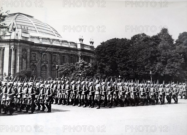 Photograph of German troops marching near the Grande Palais, in Paris, during the German occupation of France in World War Two