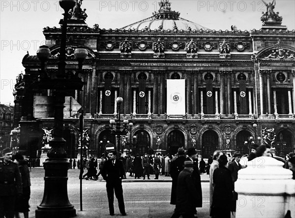 Photograph of Nazi flags hanging from the Paris Opera House, during the German occupation of France, in World War Two