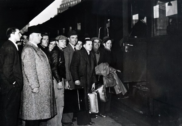 Photograph of young French men travelling by train to enlist in the military during the invasion of France in World War Two