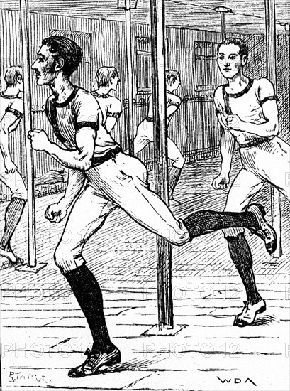 A young men sprinting, of which are members of the young men's Christian Association, inside the gymnasium at the Queen's Theatre, Long Acre, London