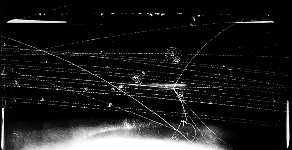 Photograph of a Bev Proton from the Cosmotron colliding with a proton in the liquid hydrogen bubble chamber