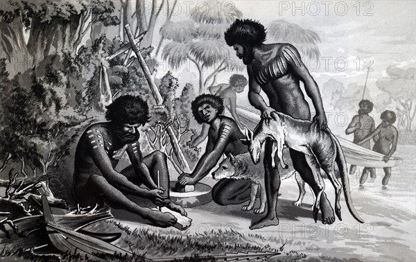 Australian aborigines preparing a meal using a bow drill a prehistoric form of drilling tool, which was used to produce fire