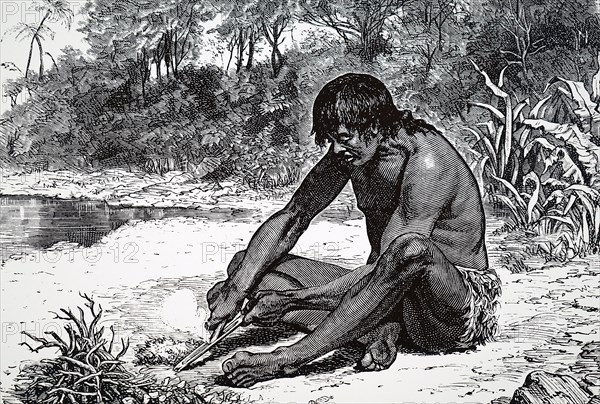 Australian aboriginal using a bow drill a prehistoric form of drilling tool, which was used to produce fire