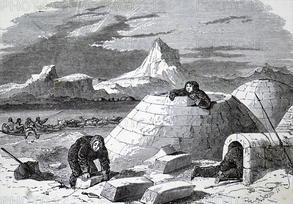 An Eskimo making an igloo