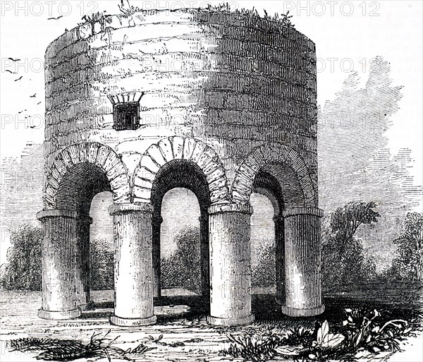 The ruins of a circular tower on pillars