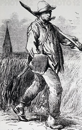 A French labourer walking with some tools