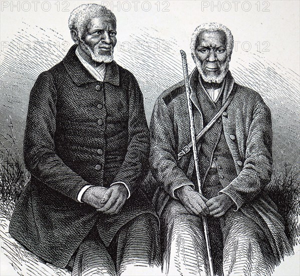 Two elderly Khoikhoi men in European dress