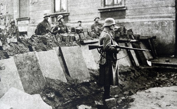 Photograph of the barricades on the streets of Berlin during the riots that ended the period of inflation