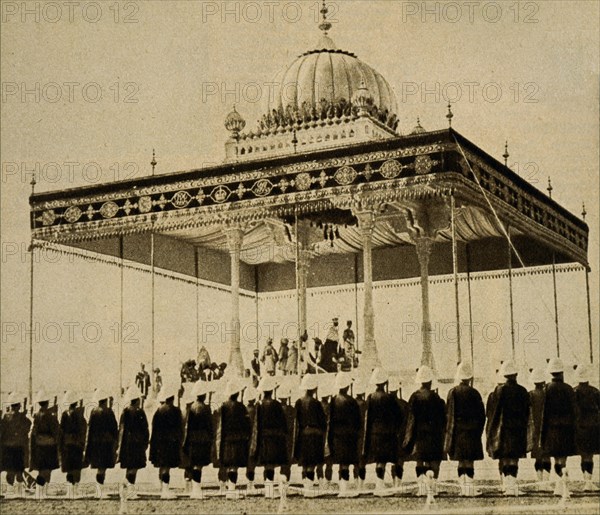 Photograph taken during the Delhi Durbar of 1911, with King George V and Queen Mary seated upon the dais