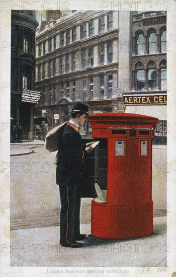 Postman in late Victorian London, collecting letters from a Royal Mail letter box