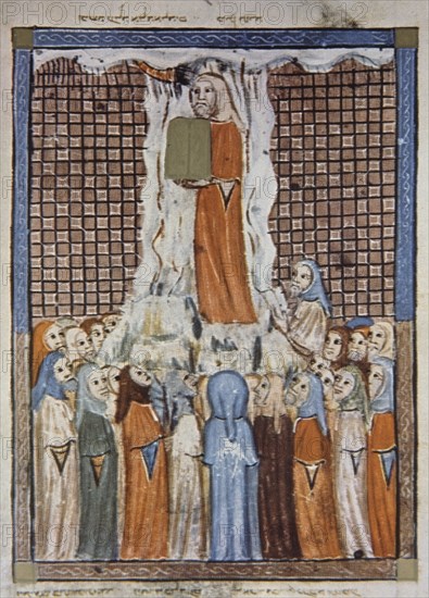 Moses presents the Ten Commandments to the Jews