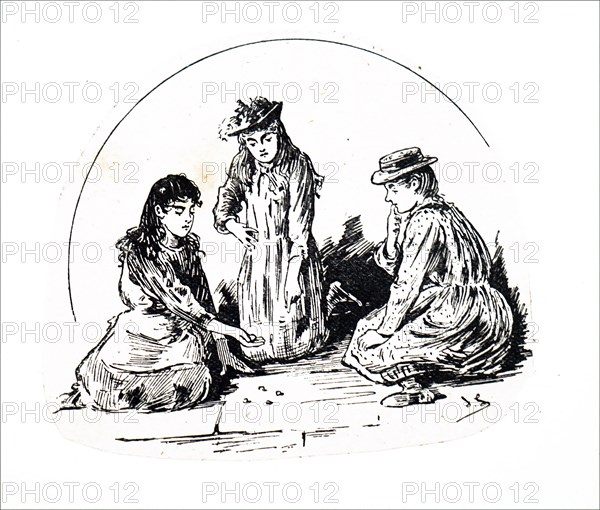 Young girls playing a street game called 'Buck and Gobs'  A number of marbles were laid on the ground, and one held in the hand