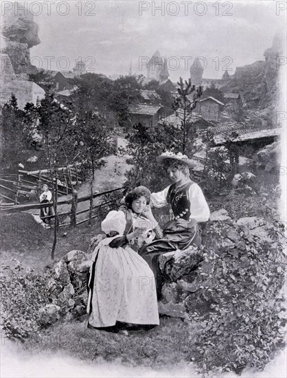 Photograph of a Swiss Village exhibit with waterfall.
