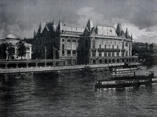 Photograph taken across the Seine showing the Palace of the City of Paris (ville de Paris).