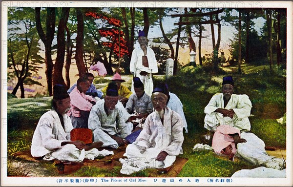 A gathering of elderly men for a picnic. Korea