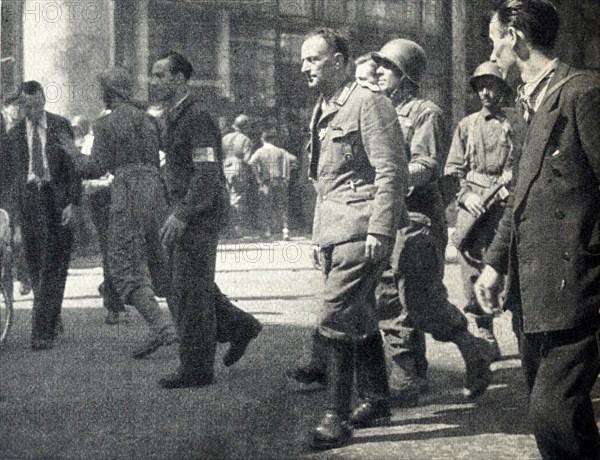 Captured German soldiers on the streets of Paris at the end of World War IICaptured German soldiers on the streets of Paris at the end of World War II