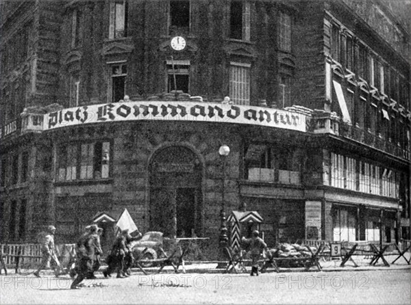 German soldiers wave the white flag of surrender on the streets of Paris at the end of World War II