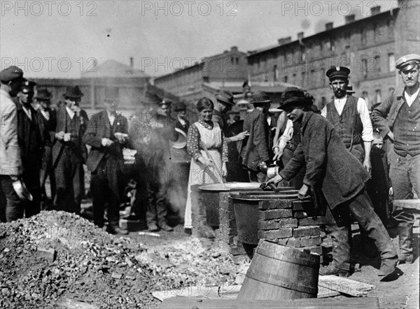 Kitchen for Polish refugees, outside of a school building barracks in 1919