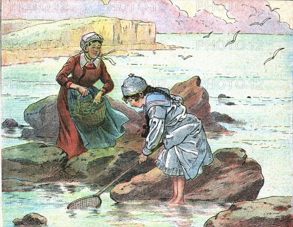 Fillette pêchant au bord de la mer