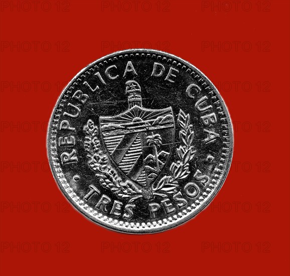 A 3 pesos coin